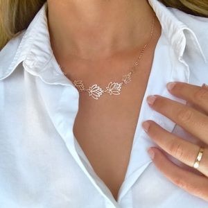 LAUREN CONRAD rose gold lotus necklace